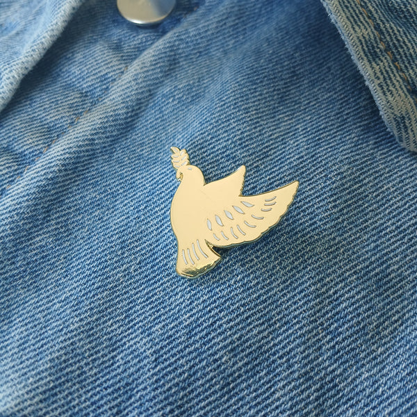 Pin's colombe dorée